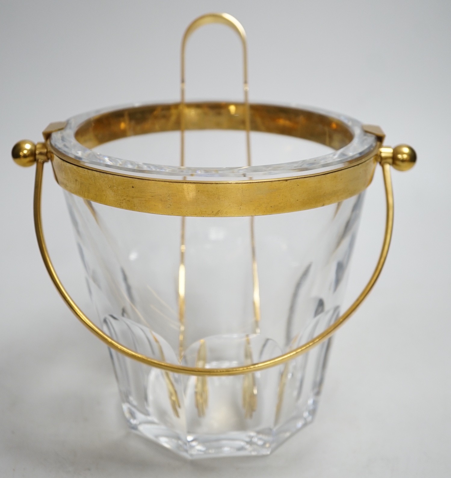 A Baccarat ice bucket, stamped, with gilt mount and matching tong. Bucket 16cm tall